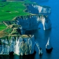 Effetti dell’<em>abrasione marina</em> su una costa alta a Etretat, in Normandia.